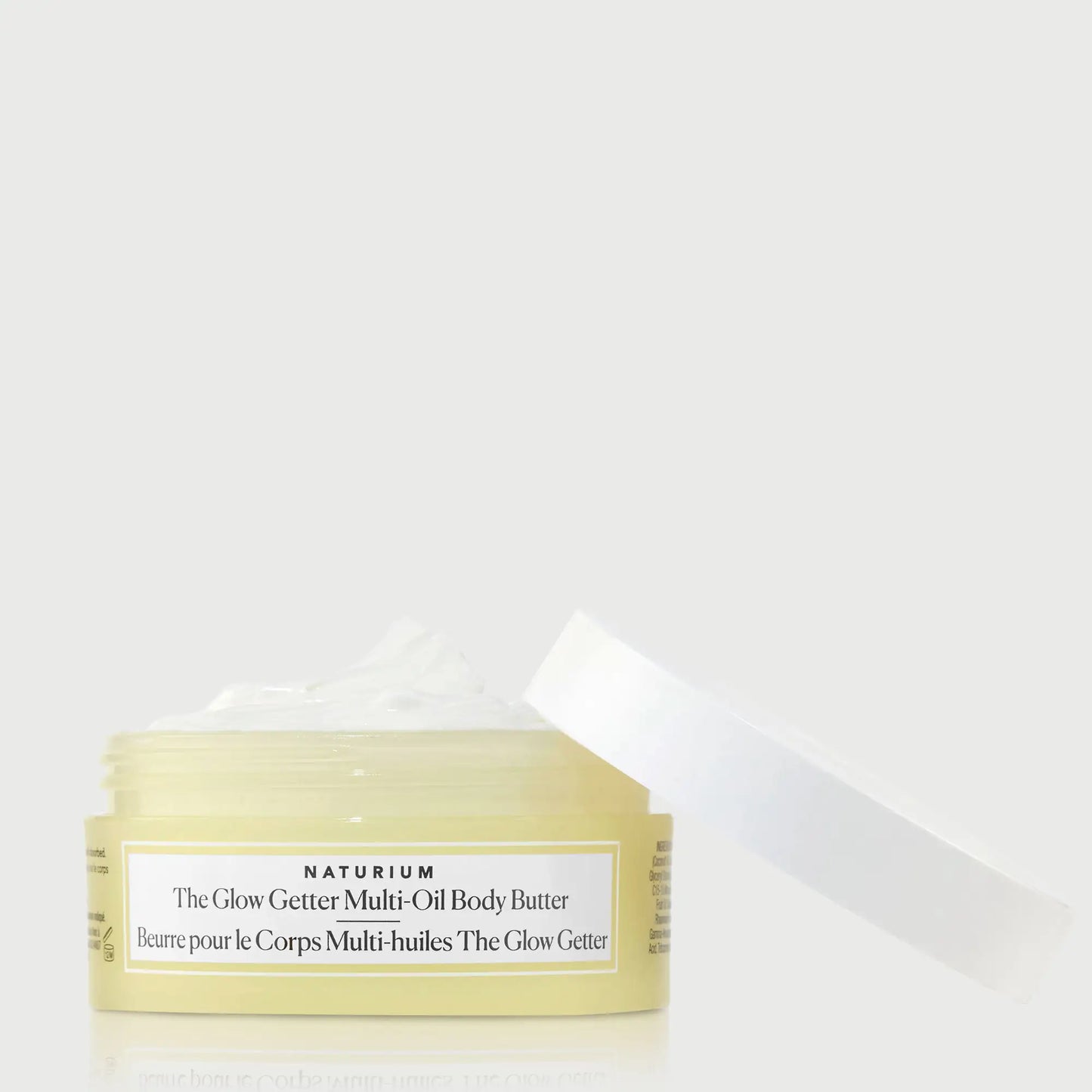 the-glow-getter-multi-oil-body-butter-travel-size-c6 NATR-40115_Glow-Getter-Body-Butter-Mini_front_capoff_bonebkgd.webp
